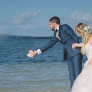 Beach Wedding Abroad Canonnier Beachcomber Golf Resort & Spa Wedding Wedding Couple By Sea